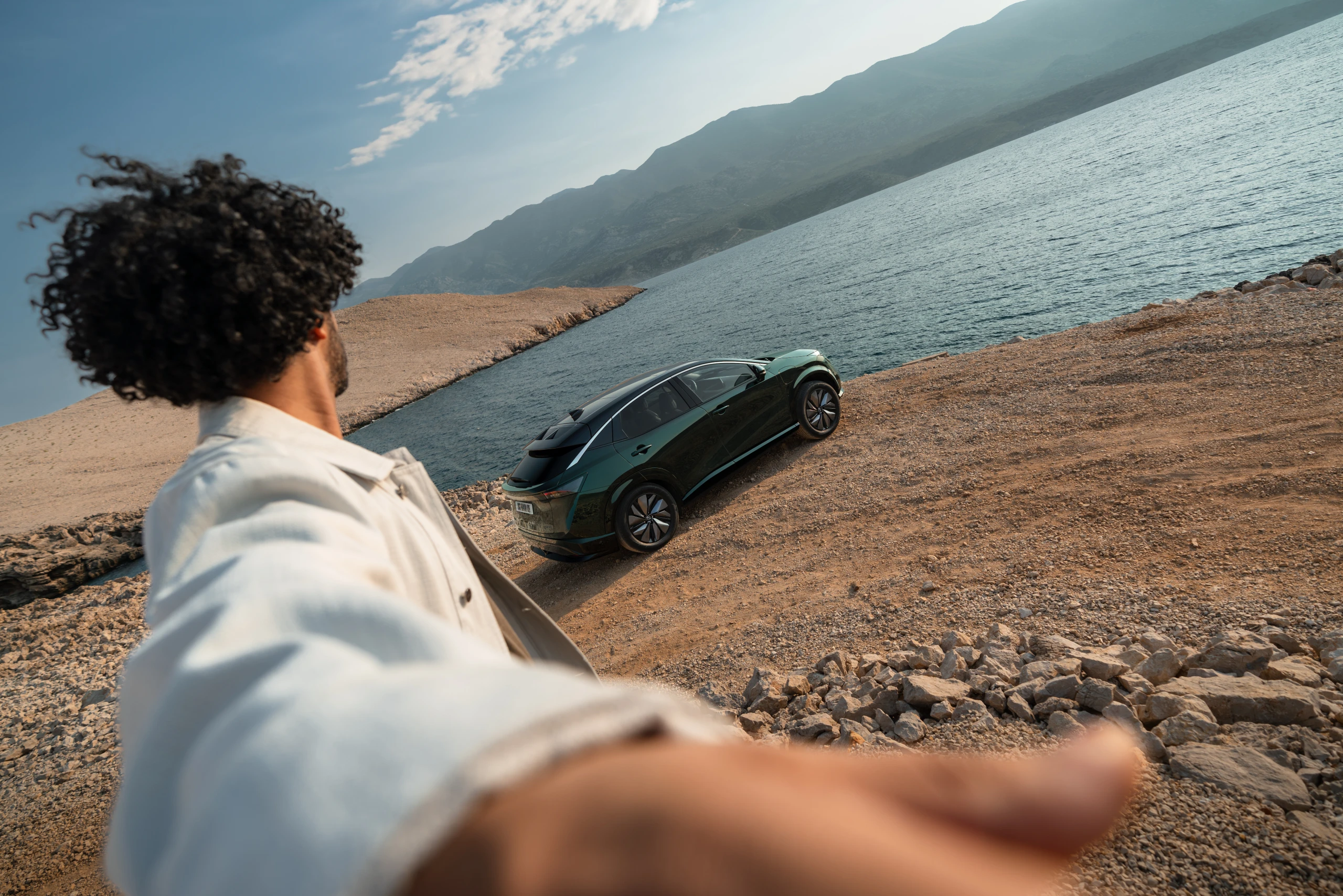 Nissan beauty shot over the lake